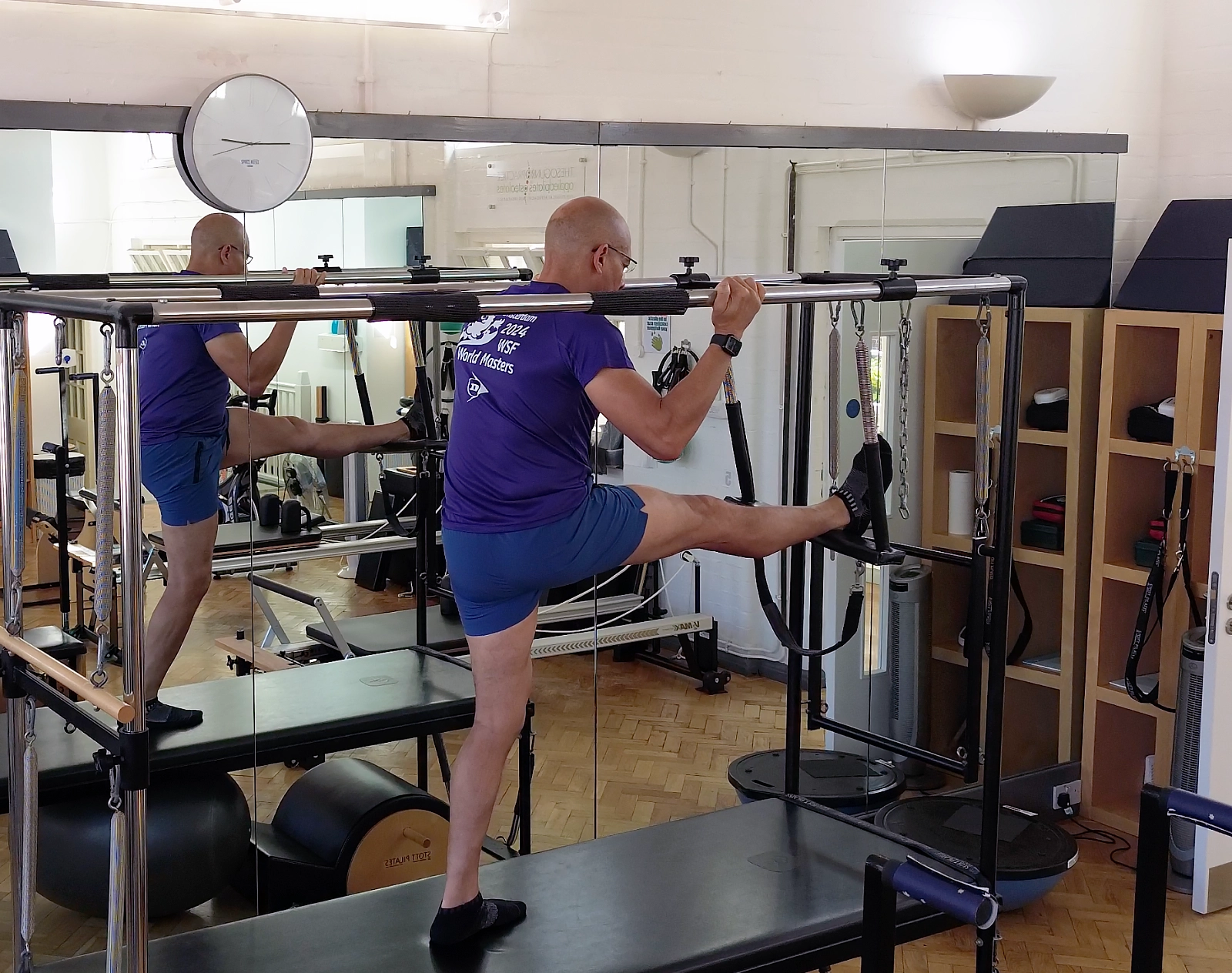 Assisted hamstring work on the Cadillac in the STOTT apparatus studio at Applied Pilates, London Colney
